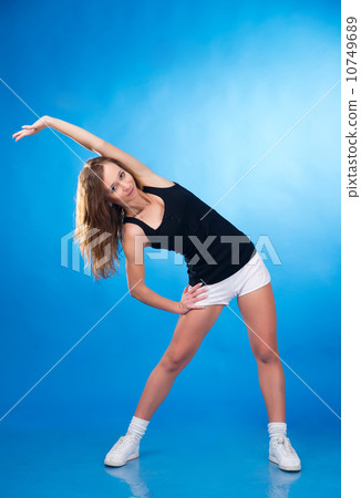 Isolated on blue sports woman 10749689