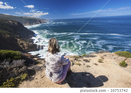 Woman Hiker Blue Ocean Cliffs Woman Hiker Blue Ocean Cliffs 10753742