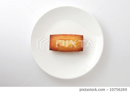 Financier French sweets on the dish White back 10756269