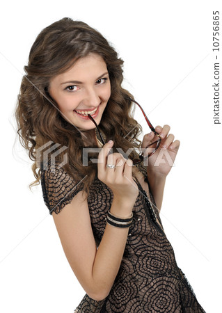 Girl in a short black dress. 10756865