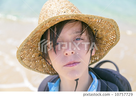 portrait of a boy with straw hat and rucksack portrait of a boy with straw hat and rucksack 10757729