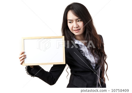 Business woman holding a blank white board Business woman holding a blank white board 10758409