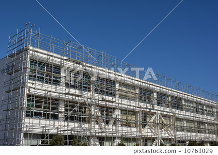 School under construction on the outside wall 10761029