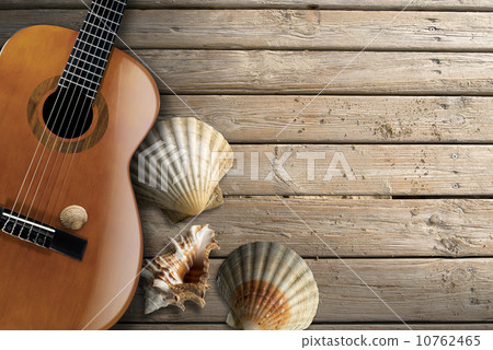 Acoustic Guitar on Wooden Boardwalk 10762465