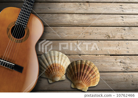 Acoustic Guitar on Wooden Boardwalk 10762466