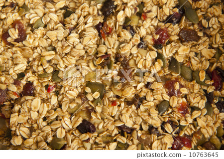 Closeup of a homemade pile of muesli Closeup of a homemade pile of muesli 10763645