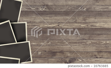 Blank Photo frame on wooden background 10763885
