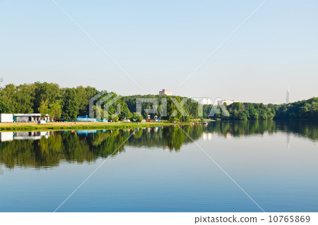 recreation area on urban river in city 10765869