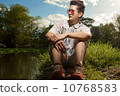 Asian man in printed polo 10768583