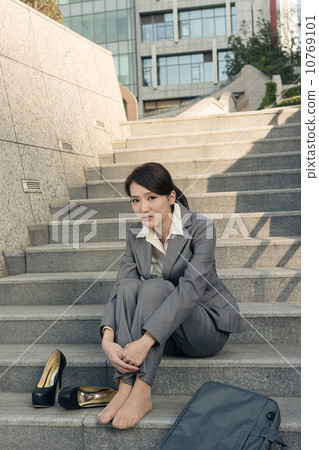 Sad business woman feel helpless 10769101