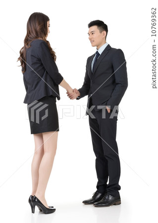 Business woman and man shake hands Business woman and man shake hands 10769362