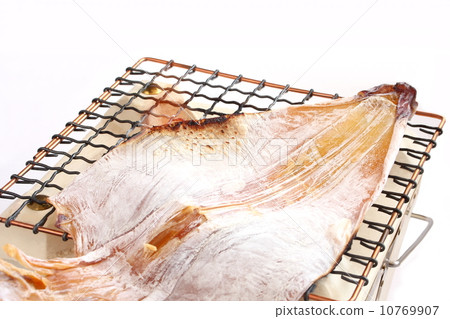 Dried squid drying charcoal grinding white background 10769907