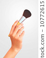Woman hand holding brush for makeup. 10772615