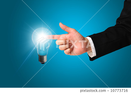Business man touching light of idea Business man touching light of idea 10773716