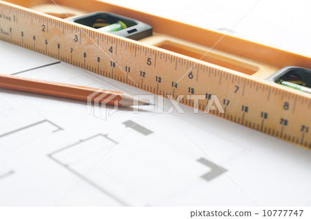 Level and pen on an architects plan  10777747