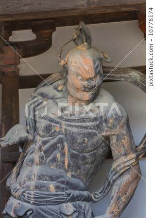 A statue of King Geumjo in Horyuji Temple gate 10778174