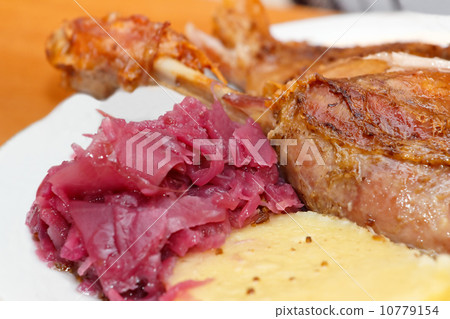 roasted duck with red cabbage and dumplings roasted duck with red cabbage and dumplings 10779154