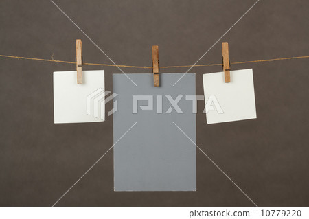 Memory note papers hanging on cord 10779220