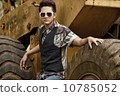 Asian man in printed polo and vest 10785052