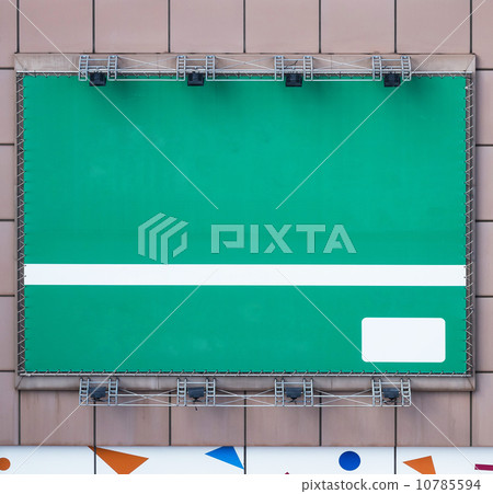 green blank billboard with spotlight for your text or picture 10785594