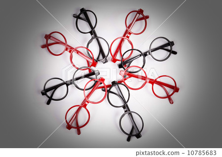 Stack of red and black glasses with vignette Stack of red and black glasses with vignette 10785683