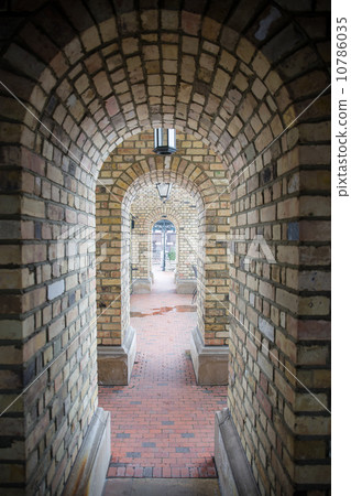 beautiful old brick arch tunnel 10786035