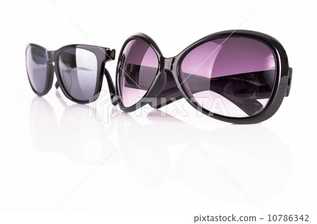 Two sunglasses isolated on white Two sunglasses isolated on white 10786342