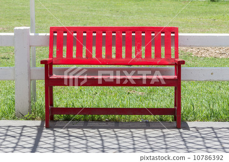 red bench in the garden red bench in the garden 10786392