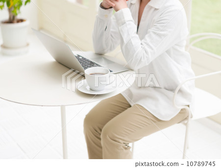 A woman in a cafe A woman in a cafe 10789745