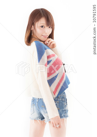 Pretty Japanese girls wearing summer sweaters on denim shorts Pretty Japanese girls wearing summer sweaters on denim shorts 10791595