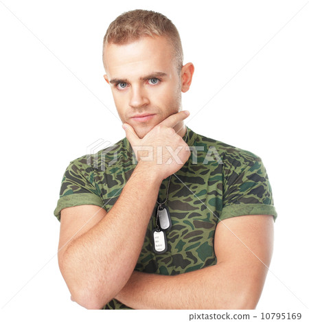 young serious army soldier with military ID tags 10795169