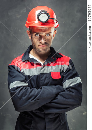 Portrait of serious coal miner 10795975