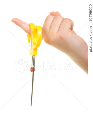 Yellow scissors hang on finger Yellow scissors hang on finger 10796000