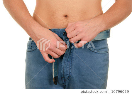 Teenager clasps fly on trousers 10796029