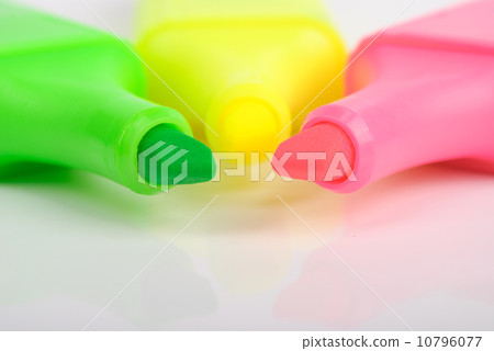 Some multi-coloured markers lie nearby 10796077