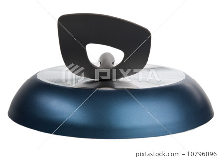 Kitchen shovel lies on turned frying pan Kitchen shovel lies on turned frying pan 10796096