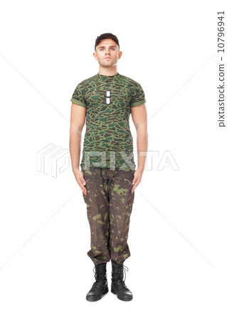 Young army soldier standing in attention Young army soldier standing in attention 10796941