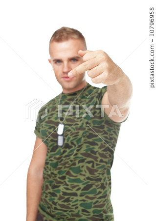 Young army soldier showing the middle fingers Young army soldier showing the middle fingers 10796958