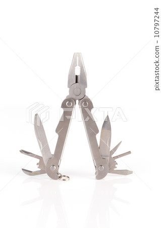 a metallic multitool isolated on white a metallic multitool isolated on white 10797244