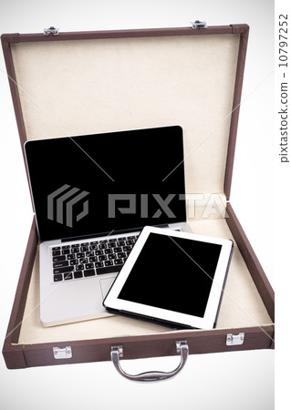 Open laptop with digital tablet in briefcase. isolated on white. 10797252