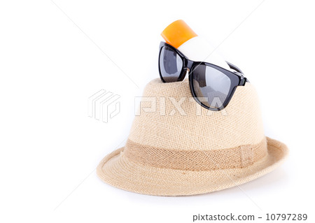 Hat , sunglasses , body lotion isolated on white background 10797289