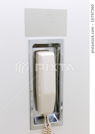 telephone in a restroom with blank stainless for your text telephone in a restroom with blank stainless for your text 10797360
