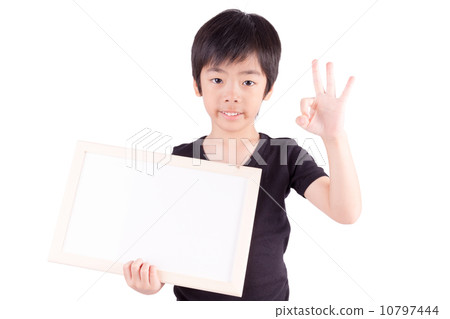 Portrait of happy schoolboy with white blank isolated on white b Portrait of happy schoolboy with white blank isolated on white b 10797444