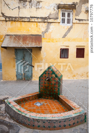 Public faucet in old Medina. Historical center of Tangier, Moroc Public faucet in old Medina. Historical center of Tangier, Moroc 10797776