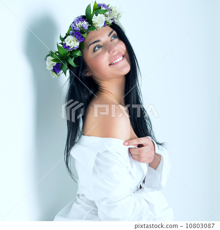 Beautiful woman wearing wreath of flowers 10803087