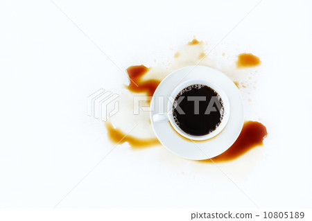 Cup of coffee on white background with stains. Breakfast. 10805189