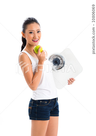 Asian woman losing weight with diet 10806069