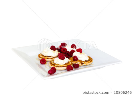 Pancakes with mascarpone and raspberries Pancakes with mascarpone and raspberries 10806246