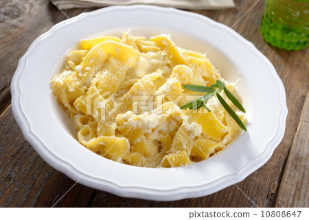 Fettuccine Alfredo with Parmesan cheese Fettuccine Alfredo with Parmesan cheese 10808647