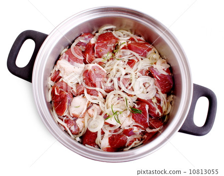 Lamb marinated with onion, spices and herbs top view 10813055